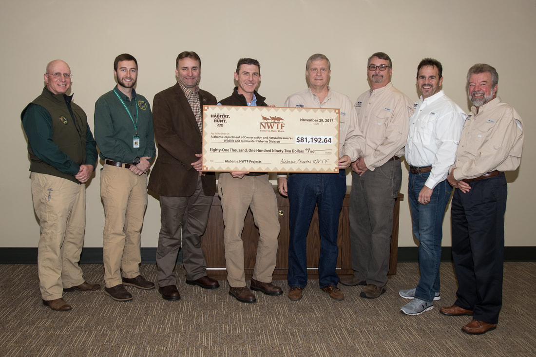 Alabama Chapter of National Wild Turkey Federation presents a check for $81,193 donation to the Alabama Division of Wildlife and Freshwater Fisheries (WFF) for programs.