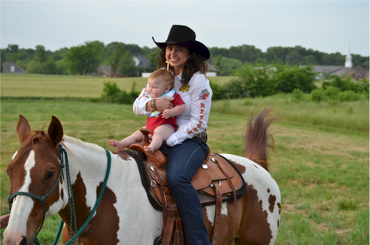 Never too young to enjoy a ride on a horse